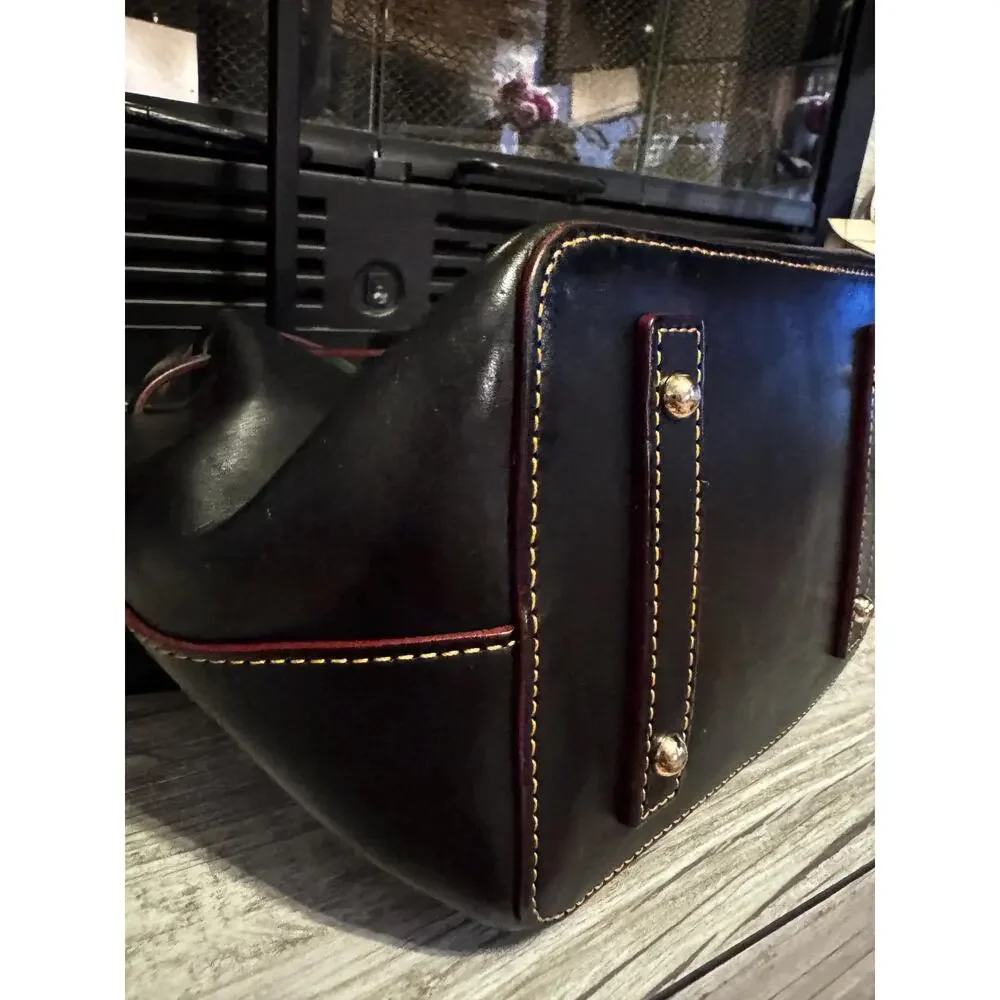 Dooney and Bourke smooth drawstring black green leather Serena Bucket bag purse